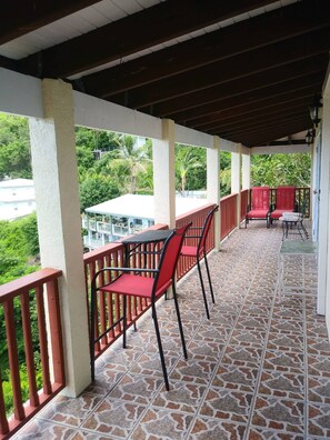 Large wrap around porch enough room for everyone to relax and take it all in.