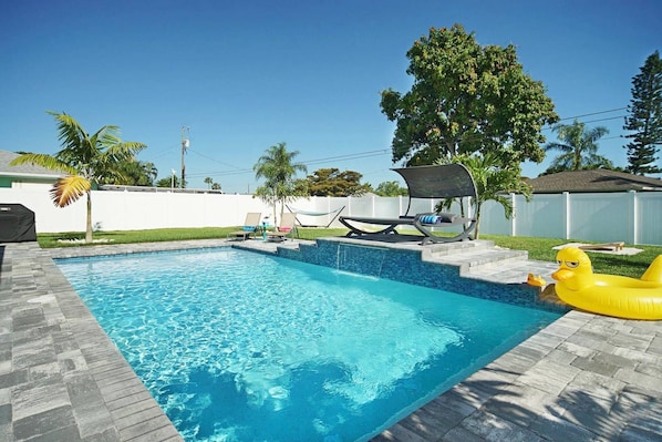Beautiful and relaxing heated pool in private backyard
