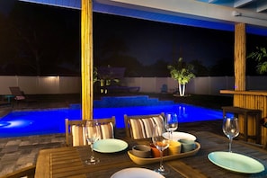 Night view of backyard from lanai