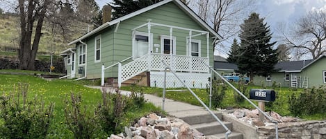 Mature trees, big yard, and only 2 blocks from Buffalo Bill’s Irma Hotel.
