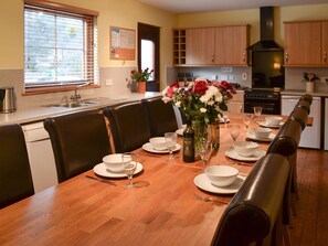 Kitchen and dining area | Woodland Lodge, Boat of Garten, near Aviemore