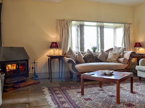 Spacious living room with wood burner | Halstead Green Farm, Colden, near Hebden Bridge