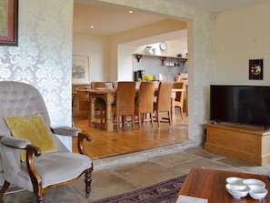 Characterful living room leading through into dining area | Halstead Green Farm, Colden, near Hebden Bridge