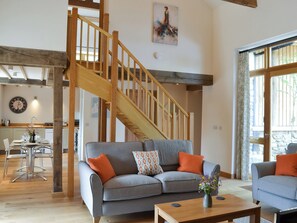 Characterful living area with exposed wood frame and beams | The Horse Gin - Higher Blagrove Farm Cottages, East Worlington, near South Molton