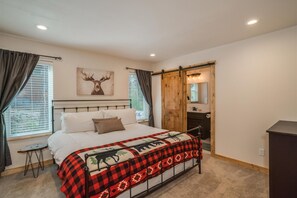 Drift off in the master suite's spacious kinig bed