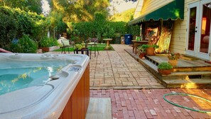 500-gallon hot tub in side yard!