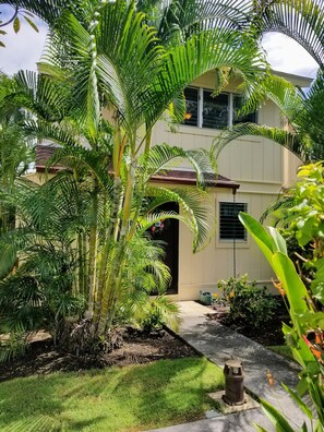 Tropical setting and private entrance to your townhome.