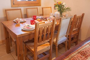 French Mountain Chalet. Dining area (at the back of the living area).