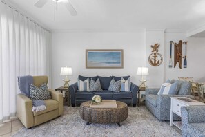 The living room sofa offers a queen sofa sleeper. 