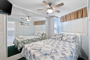 Queen size bed in primary bedroom