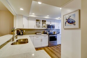 Updated kitchen with new cabinets and quartz countertops