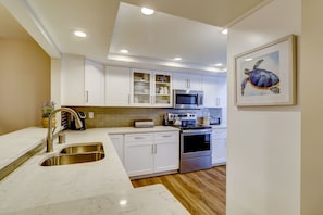 Updated kitchen with new cabinets and quartz countertops
