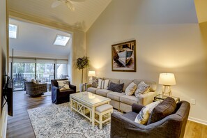 Living room opening up into sun room