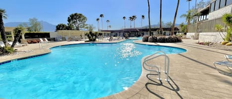 Enjoy the huge HEATED clubhouse pool with 2 hot tubs + snack bar