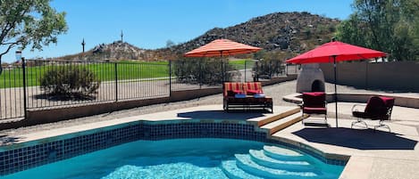 Backyard oasis with south west views of the 10th hole and mountains. 