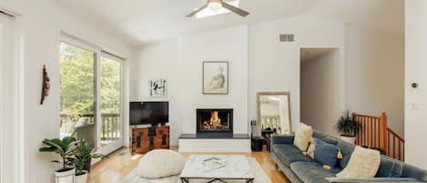 Living room with hallway leading to 3 bedrooms and 2 bathrooms. 