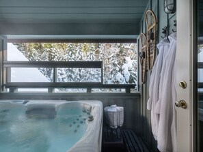 Private hot tub off the master bedroom upstairs. Suitable for 4.  Extra towels.