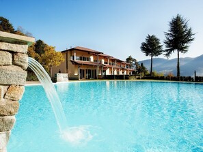 Enjoy a dip in the pool here at "Tremezzo Residence"