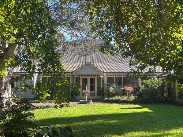 House
and grassed courtyard