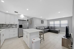 A view of the living room and the kitchen.