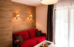 Kick back and relax on the comfortable sofa featured in the living space