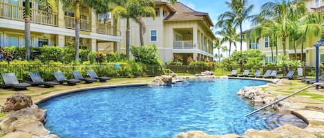 Enjoy a cocktail next to the resort style pool.