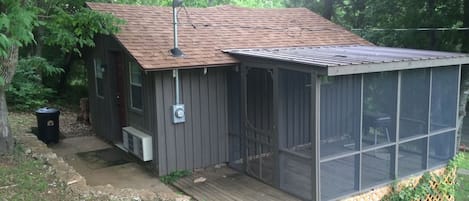 Cabin 30 Cabin entrance with side porch in view