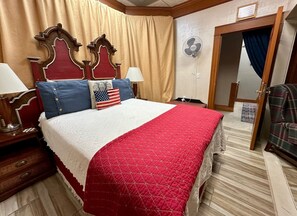Studios bedroom has a small sitting area as well.