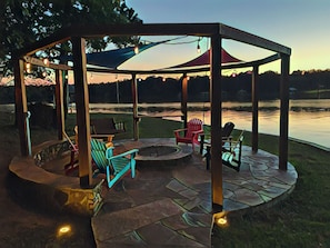 Lakeside fire pit perfect for night time gathering.