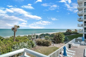 2nd-floor southern corner balcony offering stunning views of New Smyrna Beach and the Shorehom by the Sea pool