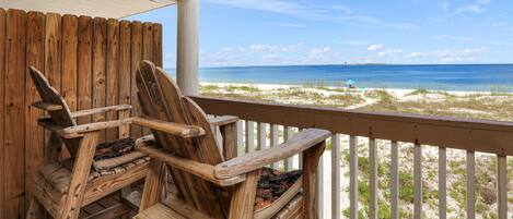 High Back Adirondacks on Gulf Front Deck