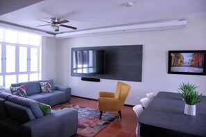Sectional sofa livingroom with 75" smart TV 