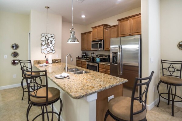 Modern Kitchen w/Stainless Steel Appliances &amp; Granite Counter Tops