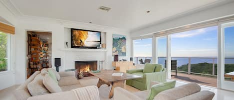 Spectacular open floor plan with 180 degree views of world famous Carbon Beach