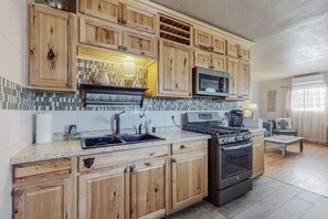 Full kitchen has a Keurig with k-cups only. We do provide a regular coffee pot as well, but only provide some k-cups to get you started.