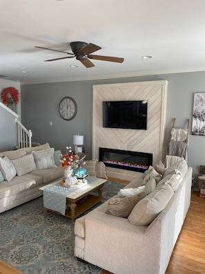 Living room w/electric fireplace
