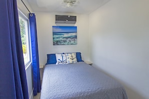 Our rentals have very comfortable queen sized beds paired with air conditioning