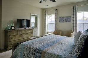 Master bedroom with smart t.v. and ensuite bathroom.