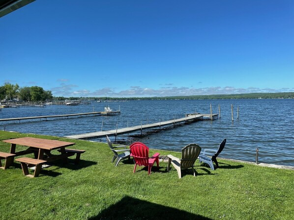 View from k yard with dock, pic-nic table, fire-pit, chairs, fire-pit