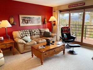 Large, cozy common area with stunning mountain view