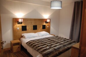 The master bedroom features a Double bed, and the living area contains a Double sofa bed.