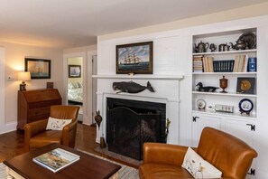 Formal Living Room Has Wood Burning Fireplace