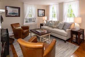 Formal Living Room is Set Between the Dining Room and Media Room