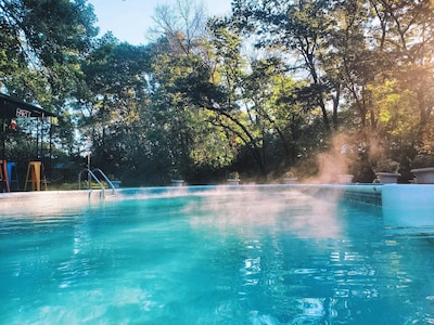 One of a kind tiny home with shared in-ground pool and hot tub