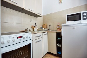 shared kitchenette (comes fully equipped with microwave, cooking utensils)
