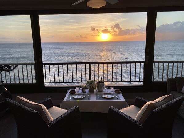 Romantic dinner over sunset alley on the Pacific Ocean with soft music and waves