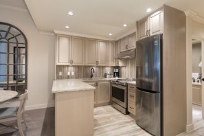 Well-equipped kitchen with stainless steel appliances