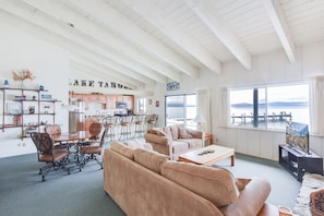 Lake view living room w/ Smart TV, gas fireplace