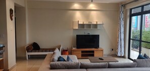 Front end view of living room. Flat screen Smart TV with Wifi access