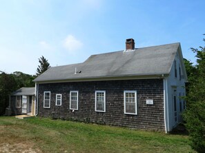 East side of house with historical marker.